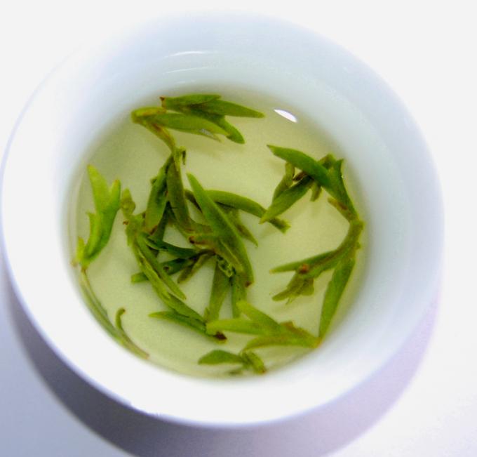 Feuille de thé fraîche de dragon de santé de puits de thé vert de forme organique de forme incurvée