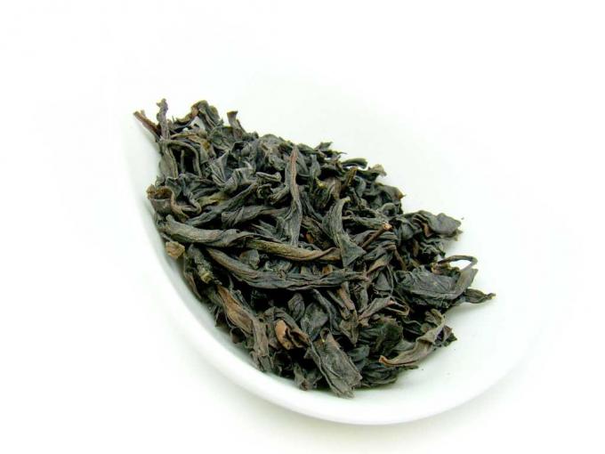 Grand thé rouge de robe longue de couleur légèrement brun-rougeâtre, thé propre d'Oolong de feuilles mobiles d'arome de fleur