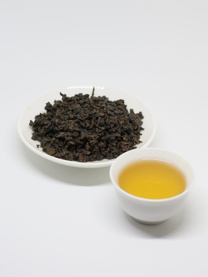 Lien organique de thé d'Oolong de ressort Guan Yin avec les feuilles de thé vertes aplaties