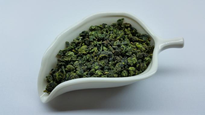 Amplifiez le thé de Tieguanyin Oolong d'énergie, lien chinois fait sauter à feu vif Guan Yin de thé